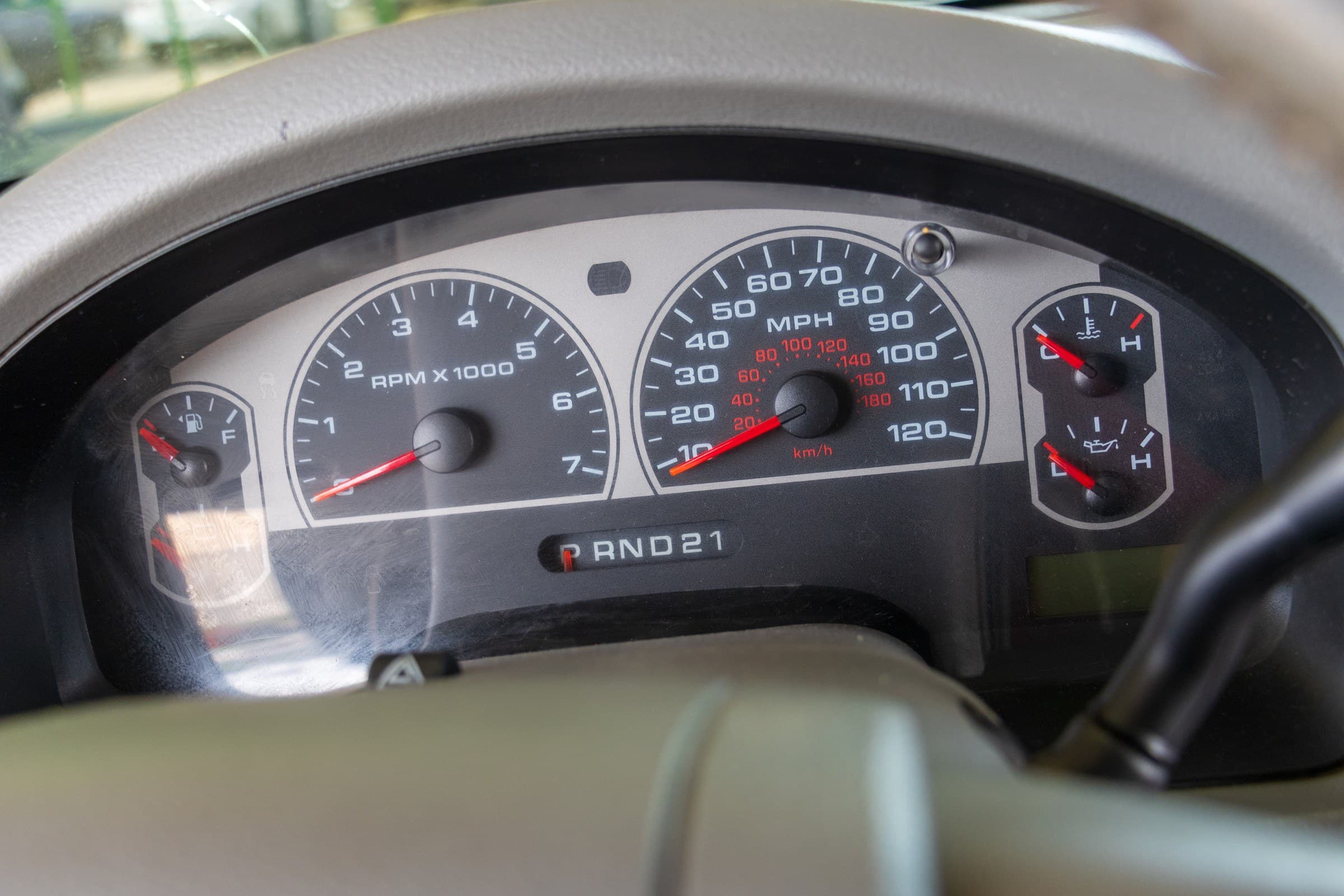 Close-up of the F-150 instrument cluster, showing the tachometer, speedometer and the fuel and temperature gauges.