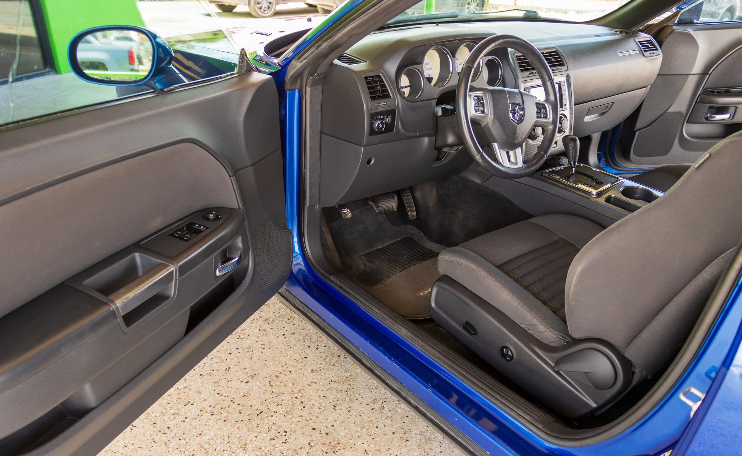 2012 Dodge Challenger R/T, driver's door open showing front seats