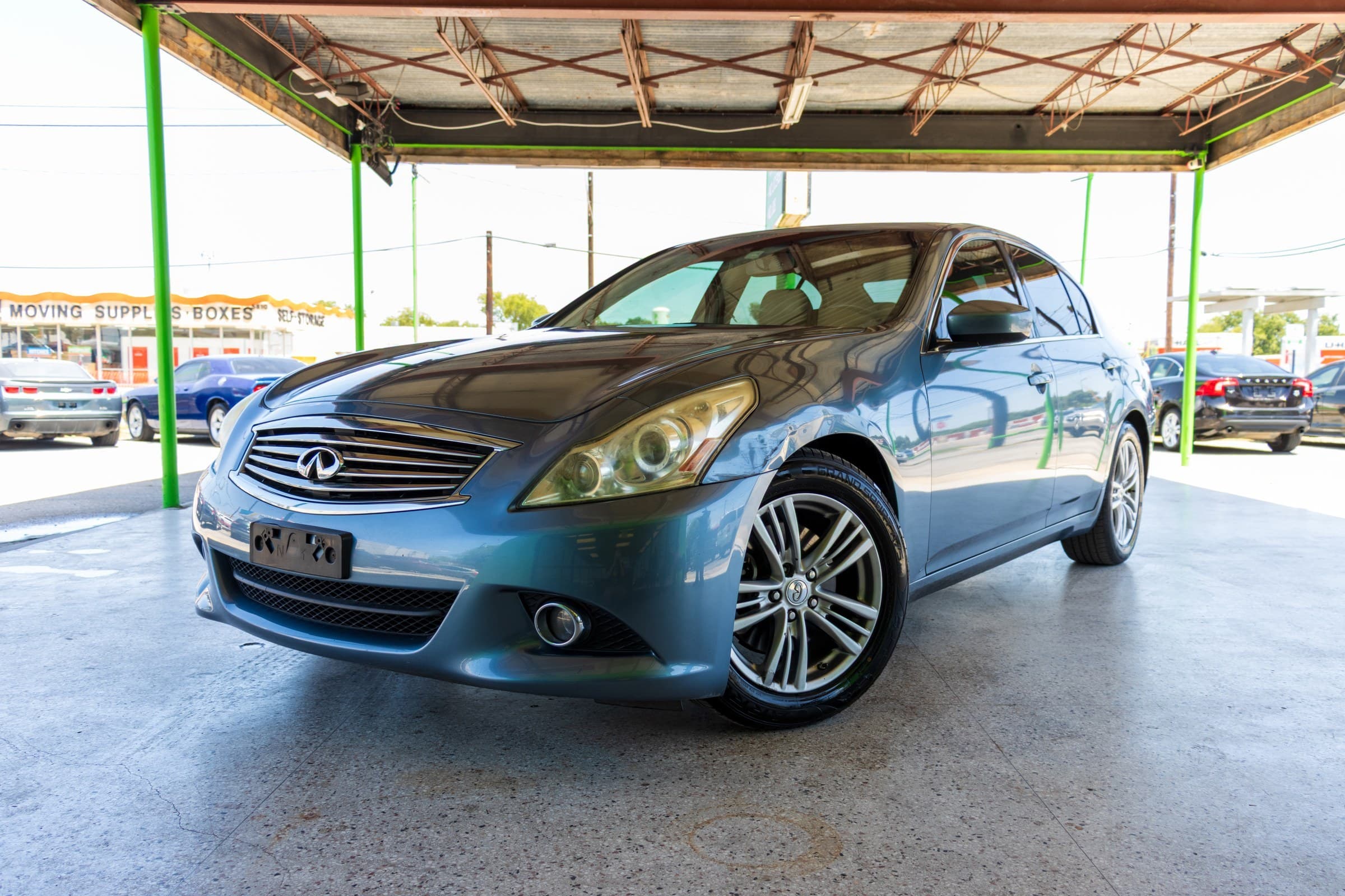 2010 INFINITI G37 Sedan in blue, front three-quarter view